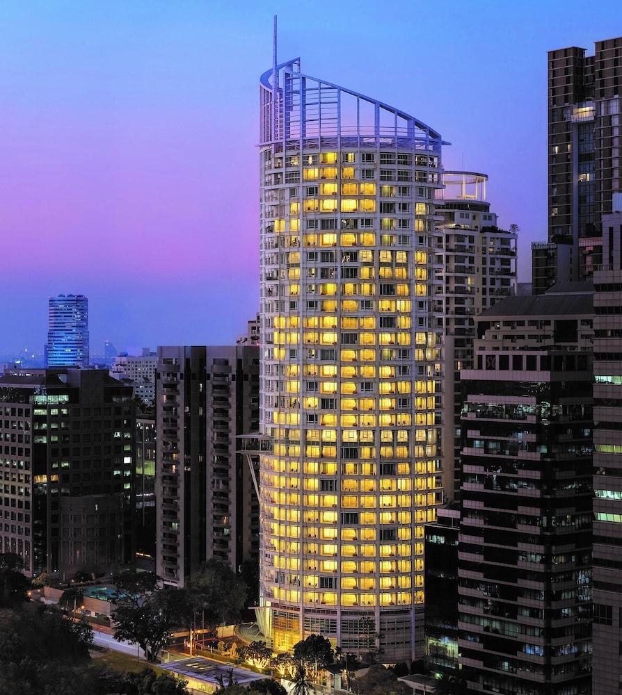 Dusit Suites Hotel Ratchadamri, Banguecoque Exterior foto The building at night