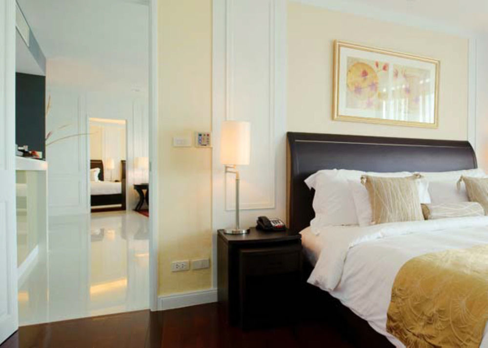 Dusit Suites Hotel Ratchadamri, Banguecoque Exterior foto A bedroom at the hotel